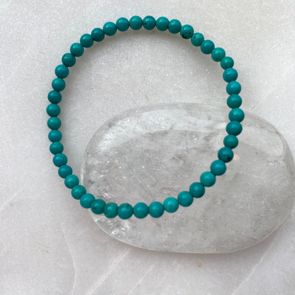 Turquoise semi precious stone elasticated beaded bracelet..jpg