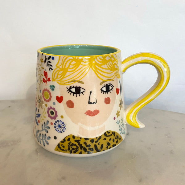 Disaster designs woman mug.jpg