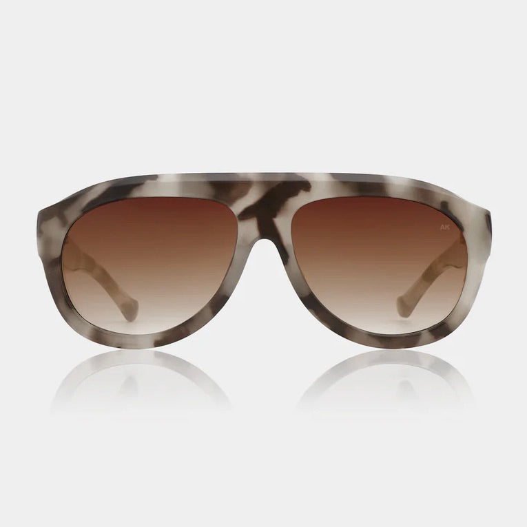 Rio A.kjaerbede Sunglasses with cookie dough frame and brown gradient lenses.jpg