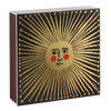Archivist Decorative box with sun design and face on a black background