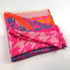 Brightly coloured patterned scarf in pink, orange, lilac and baby pink.jpg