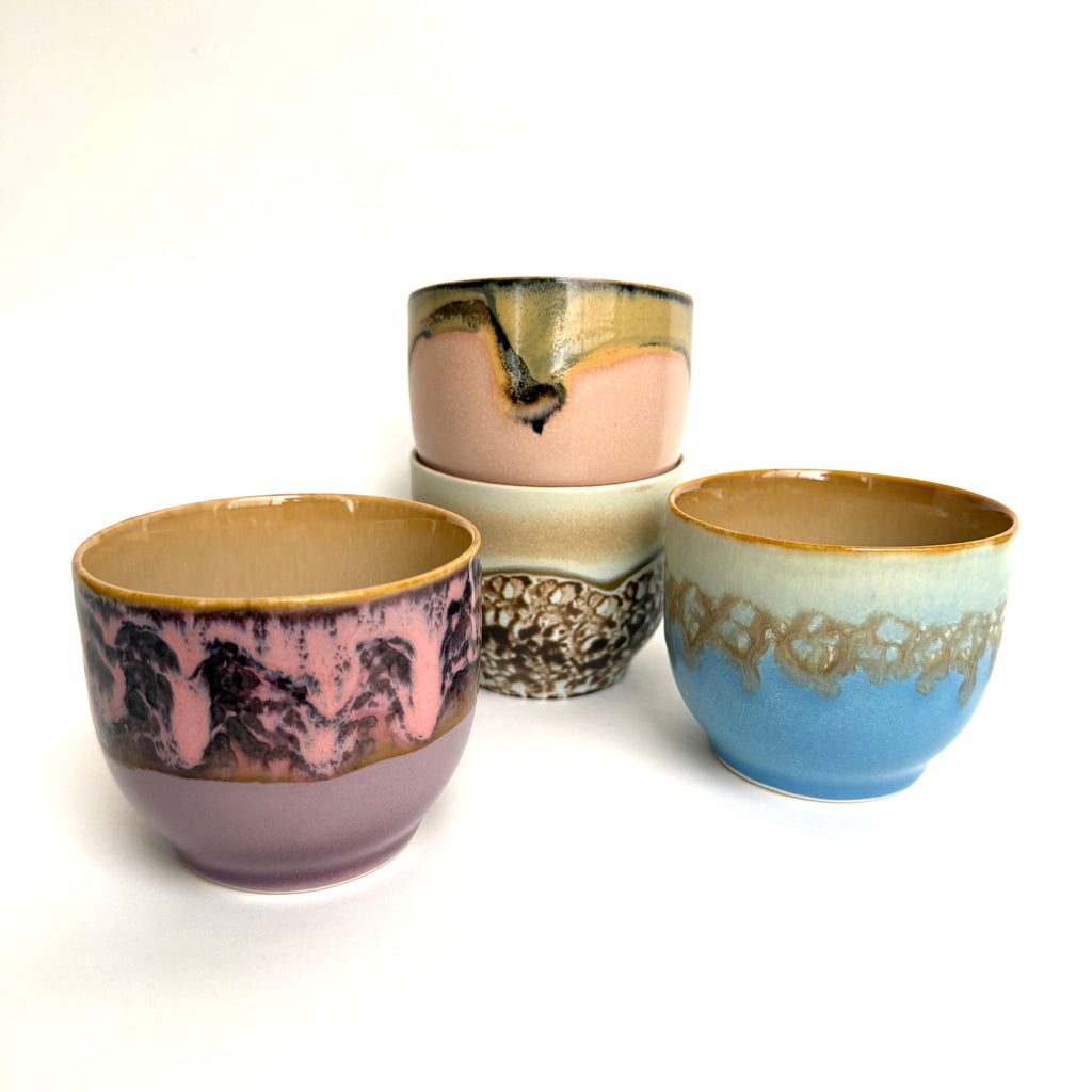 HK Living Ceramic cup with marbled design on a white background