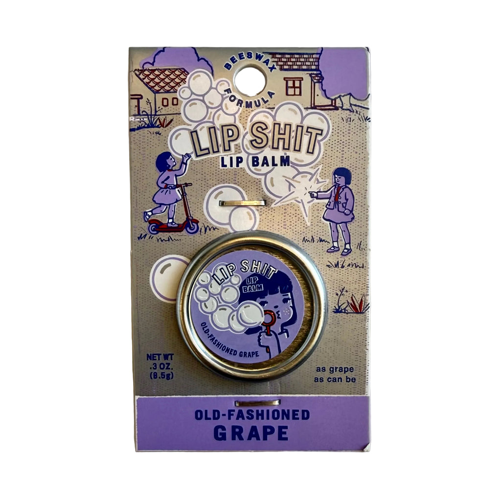 Incognito Lip balm packaging with purple and gold design on a light gray background