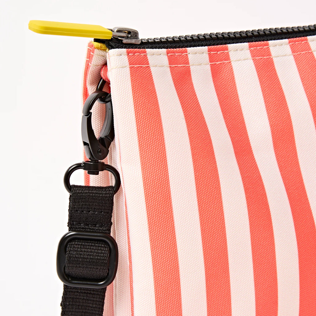 Roka Close-up of a striped pouch with a black strap and yellow zipper tab on a white background