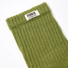 Roka 
Green sock with Roka London label on a white background