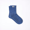 Roka Blue sock with a brand label on a white background
