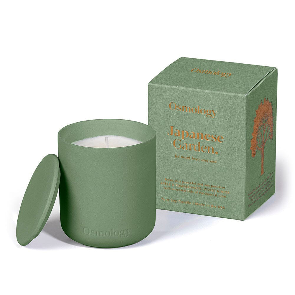 Green candle with lid and matching box on a white background Osmology Japanese garden
