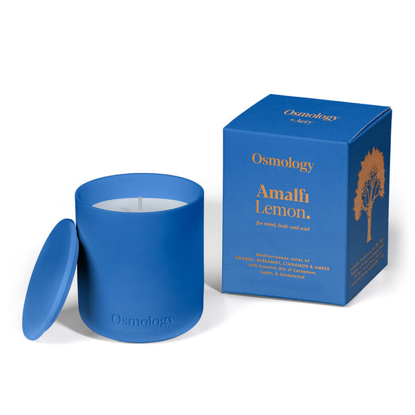 Blue candle with lid and matching packaging on a white background osmology  Amalfi lemon