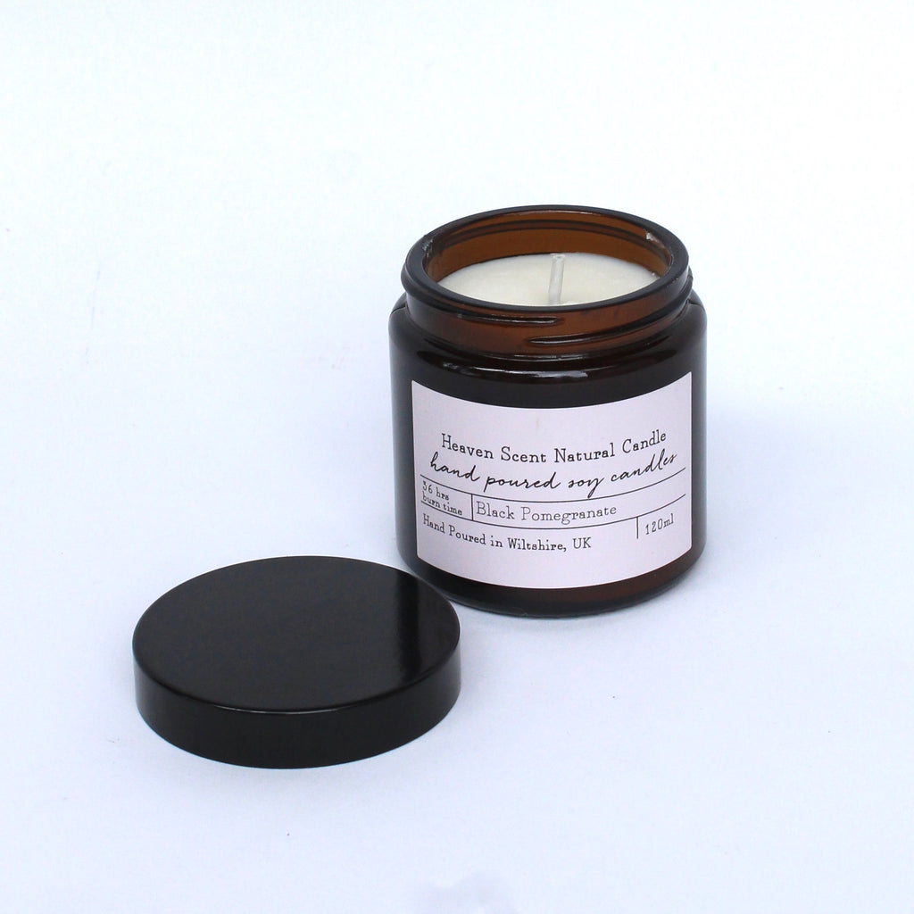 Black pomegranate scented candle brown glass jar