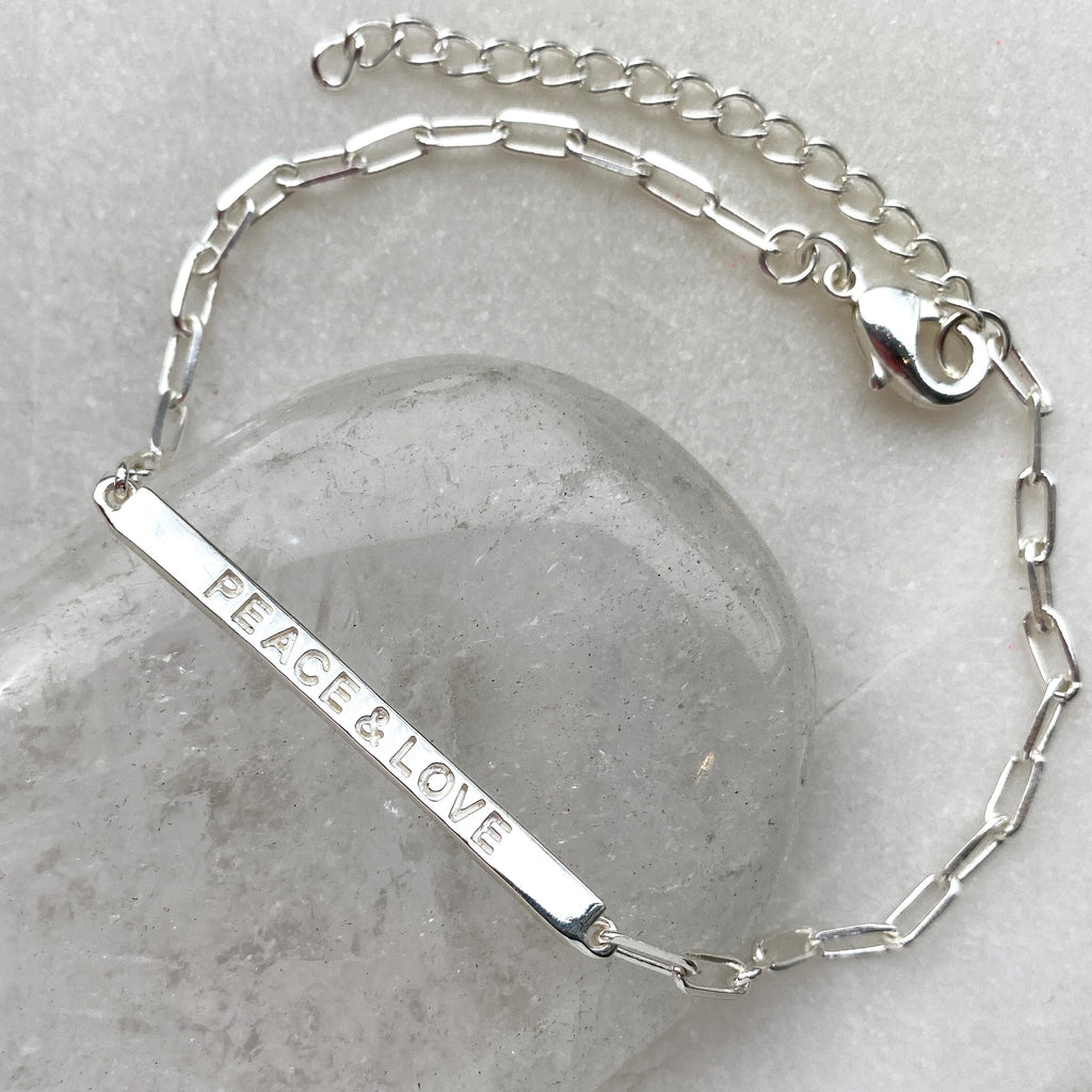 Peace and love sterling silver bar bracelet with cable chain.jpg